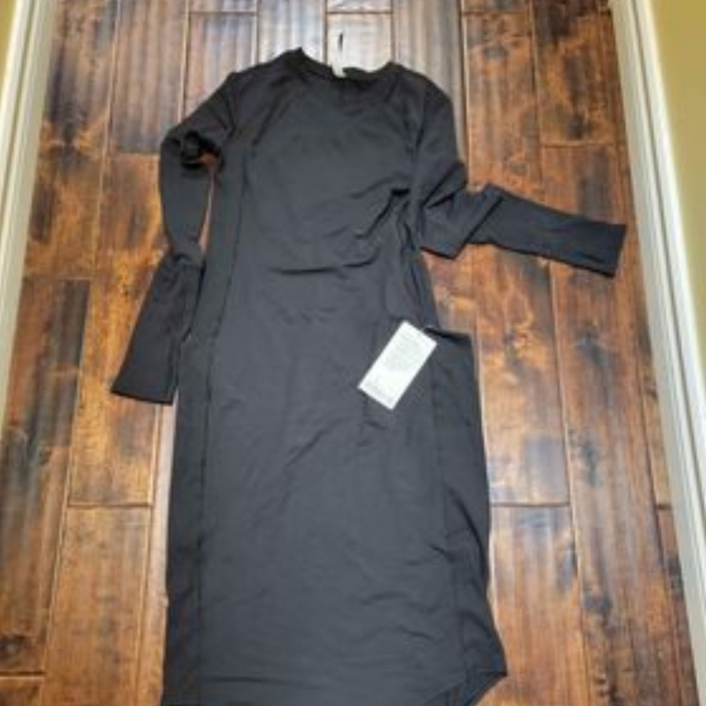 Lululemon Om and On dress. This dress is hard to find and is beautiful on!